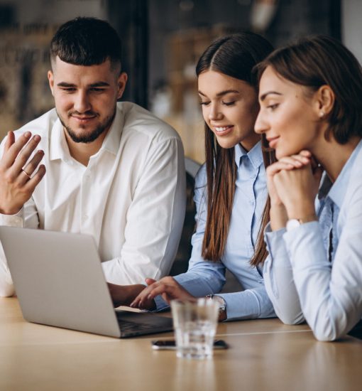 Group of people working out business plan in an office