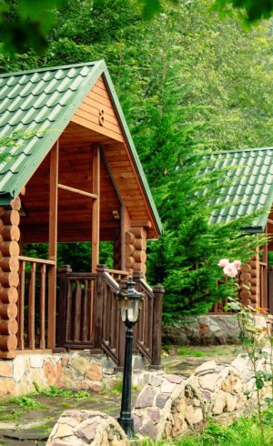 wooden-arbors-among-trees-mountains