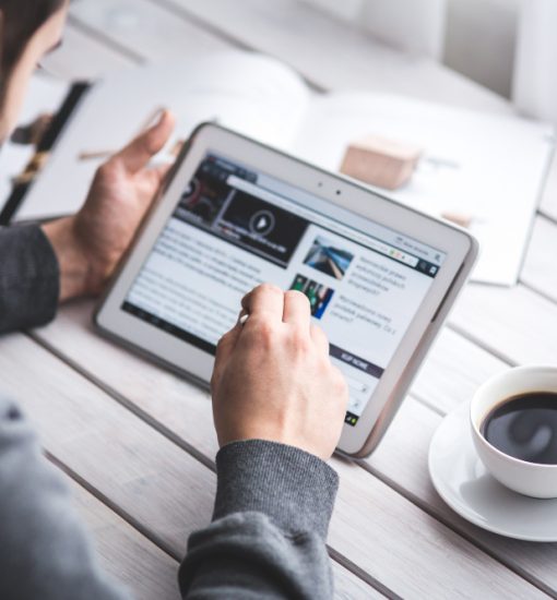 worker-reading-news-with-tablet